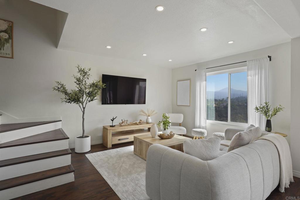 Move-in ready, spacious and set against stunning Bonita views! Recently updated 4-bedroom, 2.5-bath tri-level townhome in a private community with panoramic hillside views. Along with its prime location, this home has so many hard-to-find features! Some of those are: a chefs kitchen with double oven, beautifully redesigned bathrooms with modern finishes, new roof (installed in 2024), mini-split systems in every room, EV charger, and newer appliances. This unit also features two private balconies with unforgettable views of Bonita. 2 car attached garage has direct access to the unit. No neighbors above or below means much needed privacy! Energy-efficient solar panels provide savings on utilities. Community perks include a pool, spa, and clubhouse for residents to enjoy. No Mello-Roos! Just come see this beauty!