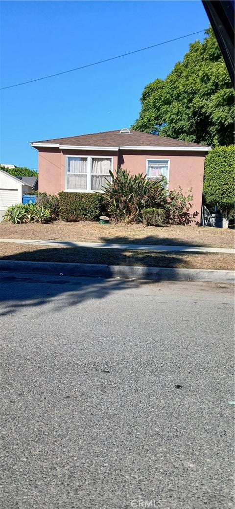 Photo of 1219 E 119th Street, Los Angeles, CA 90059 (MLS # SB26230574)