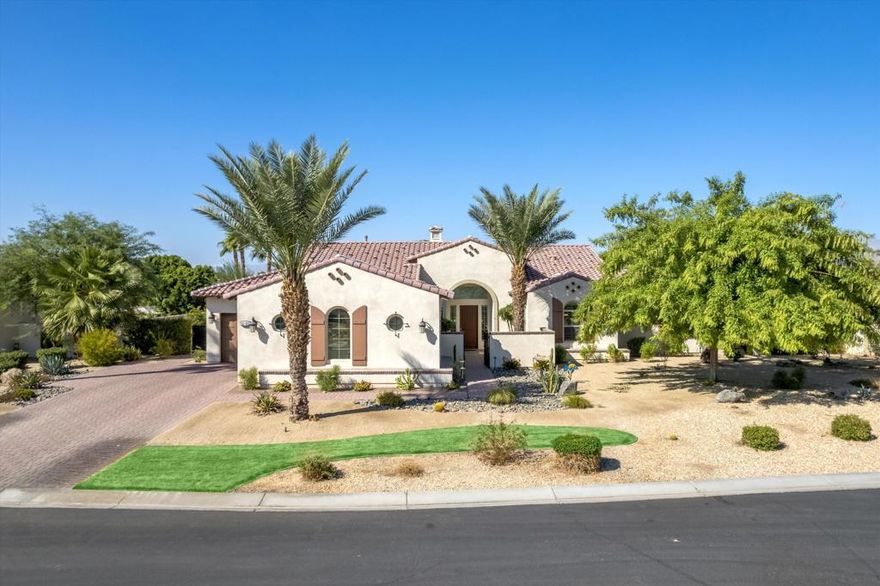 Located within the exclusive gated community of Stonefield Estates--home to just 25 estate properties--this stunning 3,405 sq. ft. residence offers bright, open living spaces with sophisticated contemporary finishes.Upon entry, you're welcomed into a spacious great room featuring soaring ceilings with exposed real wood beams, a cozy fireplace, and built-in surround sound--perfect for relaxing or entertaining.The gourmet kitchen is a chef's dream, showcasing abundant maple cabinetry, Caesarstone countertops, a large walk-in pantry, generous dining area, and an oversized island. The premium appliance package includes a Sub-Zero refrigerator, Wolf range with double ovens and vent hood, and an Asko dishwasher.The expansive Primary Suite is a true retreat, highlighted by coffered ceilings, crown molding, and a spa-inspired bathroom with dual vanities, a soaking tub, makeup vanity, and an enormous walk-in closet with custom built-ins.A spacious Junior Primary Suite is privately located on the opposite wing of the home, featuring its own luxurious bath with dual vanities and a walk-in closet. The third ensuite bedroom also includes a walk-in closet and private bathroom.Step outside to your private 1/2-acre resort-style backyard, complete with a saltwater Pebble Tec pool, raised spa with waterfall feature, covered patio, built-in BBQ, custom lighting, and plenty of space to entertain.Additional features include:Versatile flex space (currently used as a formal dining area)Porcelain tile flooring throughoutSoft water systemPlantation shutters3-car garage with epoxy flooringAll located just minutes from the Empire Polo Grounds--home to the world-renowned Coachella and Stagecoach music festivals.Call today to schedule your private showing!