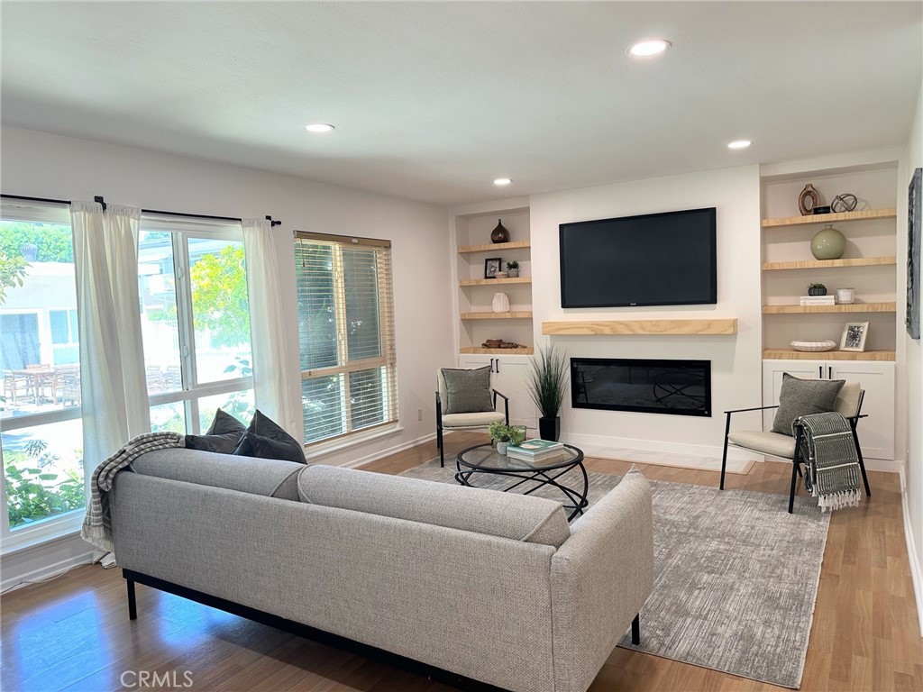 Sought after rare GROUND LEVEL END UNIT CONDO in the heart of Torrance. One of the best location closer to front gate & pool. and easy street access to the tree-lined Merrill Drive. Spacious living room with modern built-in electric heater, wood shelving & recessed lightings. Dining area adjacent to the open kitchen and patio door access the private patio. Large two bedrooms with newer floorings. Primary bedroom has it's own updated bathroom. Smooth ceilings throughout. Double pane windows. Smart home features with lighting & front door lock. Lots of storage & many newer upgrades. Laundry room is a short distance away & has a locked storage space for this condo, with HOA approval, Private Laundry hook- up maybe installed inside the unit hall closet. West Del Amo Pacific condominiums is a Pet Friendly complex with pool & recreation room. HOA dues included water, trash, cable TV & internet, buyers to verify. Close proximity to Del Amo Fashion Center, Wilson Park, famous Torrance Farmer's Market and local shops.