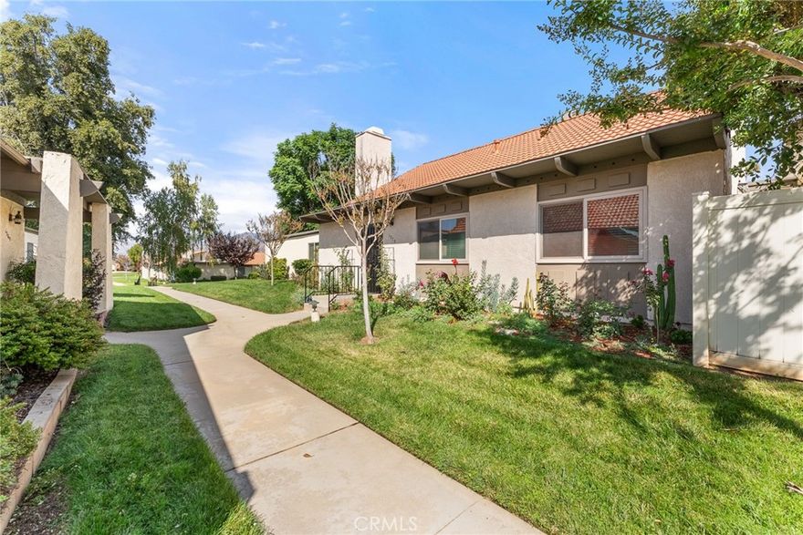 Stunning Carefree Village Two Story Home.  Downstairs Master Bedroom with Sitting/Bonus area and Bath, Livingroom/Great room with Fireplace, Upgraded Kitchen with lovely view of the Patio area.  Upstairs has Two Bedrooms Plus Bath and Family room with Great Mountain Views.  Carefree Village is located close to the University of Redlands, Moore Middle School and Shopping and Medical.  Enjoy the amenities including Swimming and Tennis.