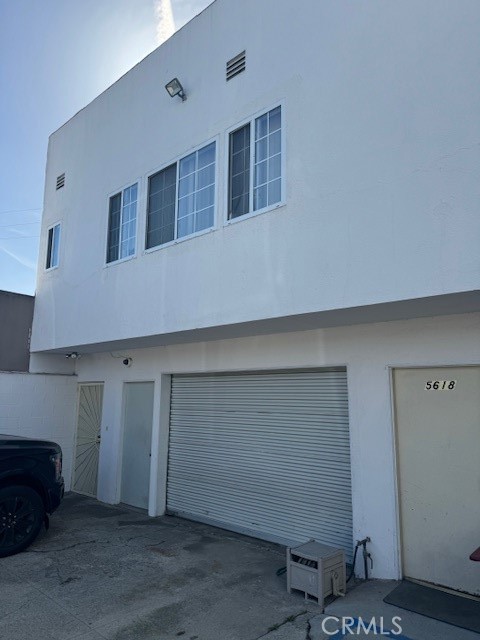 This is a mixed use building. There is a 2 bedroom 2 bath unit on the second floor that is occupied. Downstairs was used for an office and a one bedroom unit or it can be used as a two bedroom unit that is now vacant. There is also a third unit that is being used as an upholstery shop This unique build has room to add more space or units, There is also a one car attached garage. This property is perfect for someone that needs an office and a small living area and could rent or use upstars apartment