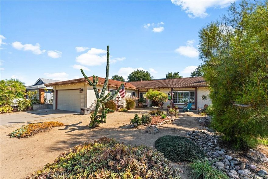 Welcome to this beautifully updated 4-bedroom, 2-bathroom home nestled in the highly desirable Meredith Parkwood neighborhood of Santa Ana, within the sought after Tustin Unified School District. Offering 1,606 sq ft of thoughtfully designed, single-story living, this home combines modern upgrades with classic charm. 

Inside, enjoy tile flooring, crown molding, custom paint, and newer double-paned windows throughout. The spacious living room features a striking granite fireplace with a custom mantle, creating a warm and stylish focal point.

The heart of the home is the gourmet entertainer’s kitchen and adjoining dining area boasting granite countertops, custom cabinetry, a large center island, 6-burner gas stove, stylish backsplash, stainless steel appliances, a built-in hutch with wine cooler and a separate pantry.

Primary bedroom has its own ensuite bath with view and access of beautiful backyard.   

The front yard features drought-tolerant landscaping for easy maintenance and curb appeal, while the backyard is a private oasis with a large covered patio, peaceful koi pond, and an inviting above-ground spa — ideal for relaxing or entertaining.

Additional highlights include:

• Fully owned solar system for energy efficiency

• Dedicated indoor laundry room

• Attached 2-car garage.

Located near parks, shopping, dining, and major commuter routes, this move-in ready home offers comfort, efficiency, and lifestyle in one of Santa Ana’s most desirable neighborhoods.