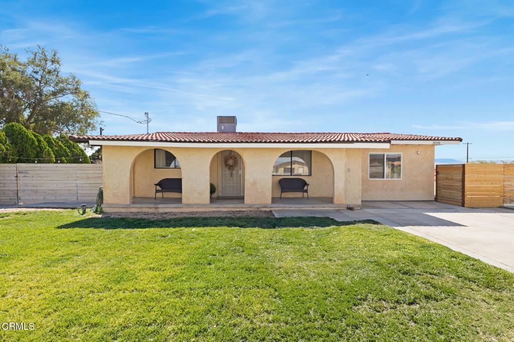 **Remodeled 3 Bedroom / 2 Bathroom Single-Story Charmer on 1.28 Acres with Paid Solar!** This beautifully updated 3 bedroom, 2 bathroom home sits on a spacious 1.28 acre lot and offers nearly everything you could ask for - modern upgrades, abundant land, and even a full 3 bedroom, 1 bathroom ADU. With 1,244 sq ft of main living space and a thoughtful remodel from top to bottom, this home is truly one-of-a-kind. From the curb, you'll notice the inviting front yard with lush grass, a modern wooden fence providing backyard privacy, and an expanded front concrete pad for extra parking or toys. Inside, the home impresses with a uniquely renovated floor plan, recessed lighting, new laminate flooring, and a custom dining area filled with natural light. The kitchen has been beautifully upgraded with newer cabinets, large countertops, a stainless steel sink, and modern finishes, all open to the dining space for effortless flow. Bathrooms have also been fully remodeled: the hall bath features dual sinks, tile flooring, and a custom tile shower with gold finishes, while the primary suite includes a walk-in closet, upgraded vanity, and a spa-like walk-in shower with floor-to-ceiling tile. The main home also boasts a new A/C and furnace system, a tankless water heater, and paid-for solar to keep utility costs low. Step outside to a backyard full of possibilities - two storage sheds, cross-fencing, and plenty of room for hobbies, animals, or expansion. Adding even more value, the property includes a fully functioning ADU with 3 bedrooms, 1 bathroom, its own kitchen, and a living area, making it perfect for extended family or rental income. With two separate entrances to the property, there's flexibility for privacy and convenience. Homes with this level of upgrades, space, and versatility are extremely rare. Don't miss your chance to own this Lancaster gem - schedule your showing today before it's gone!