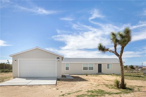 Photo of 3614 Surrey Avenue, Yucca Valley, CA 92284 (MLS # JT26049595)