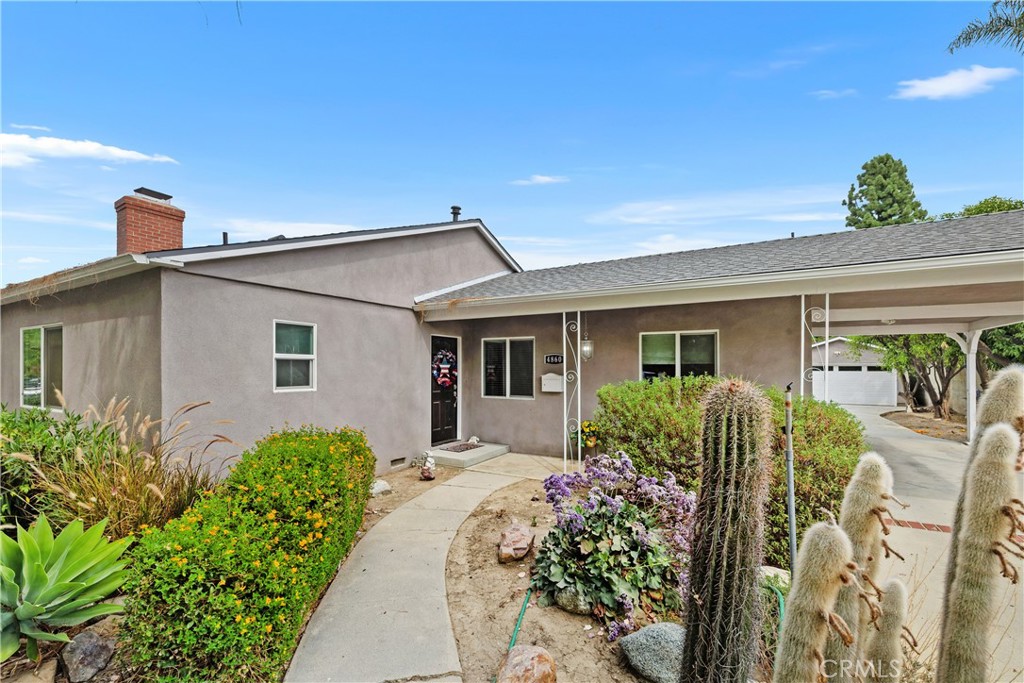Welcome to this beautifully updated property nestled in one of Encino’s most coveted neighborhoods, this beautifully updated residence offers the perfect blend of luxury, functionality, and California charm. Boasting 4 spacious bedrooms and 4 sleek, modern bathrooms, the home is thoughtfully designed to accommodate today’s lifestyle with elegance and ease. Step into a bright, open-concept living space where natural light pours in, highlighting the seamless flow between the living room and the state-of-the-art chef’s kitchen. This culinary haven features professional-grade appliances, including dual convection ovens, a six-burner gas range with a flat-top griddle, and a sleek stainless steel vent hood for powerful ventilation. The oversized kitchen island provides ample space for meal prep, casual dining, and entertaining. Outside, the property is a true oasis, adorned with fruit-bearing trees including fig, lime, tangerine, orange, and grapefruit—perfect for enjoying fresh, seasonal harvests right from your backyard. The primary suite is a private retreat, complete with a walk-in closet and a sliding glass door that opens directly to the serene backyard. Whether you're working remotely or need a quiet space to focus, the dedicated home office offers comfort and productivity. Additional highlights include a large two-car garage, an extended driveway that accommodates up to three additional vehicles.
