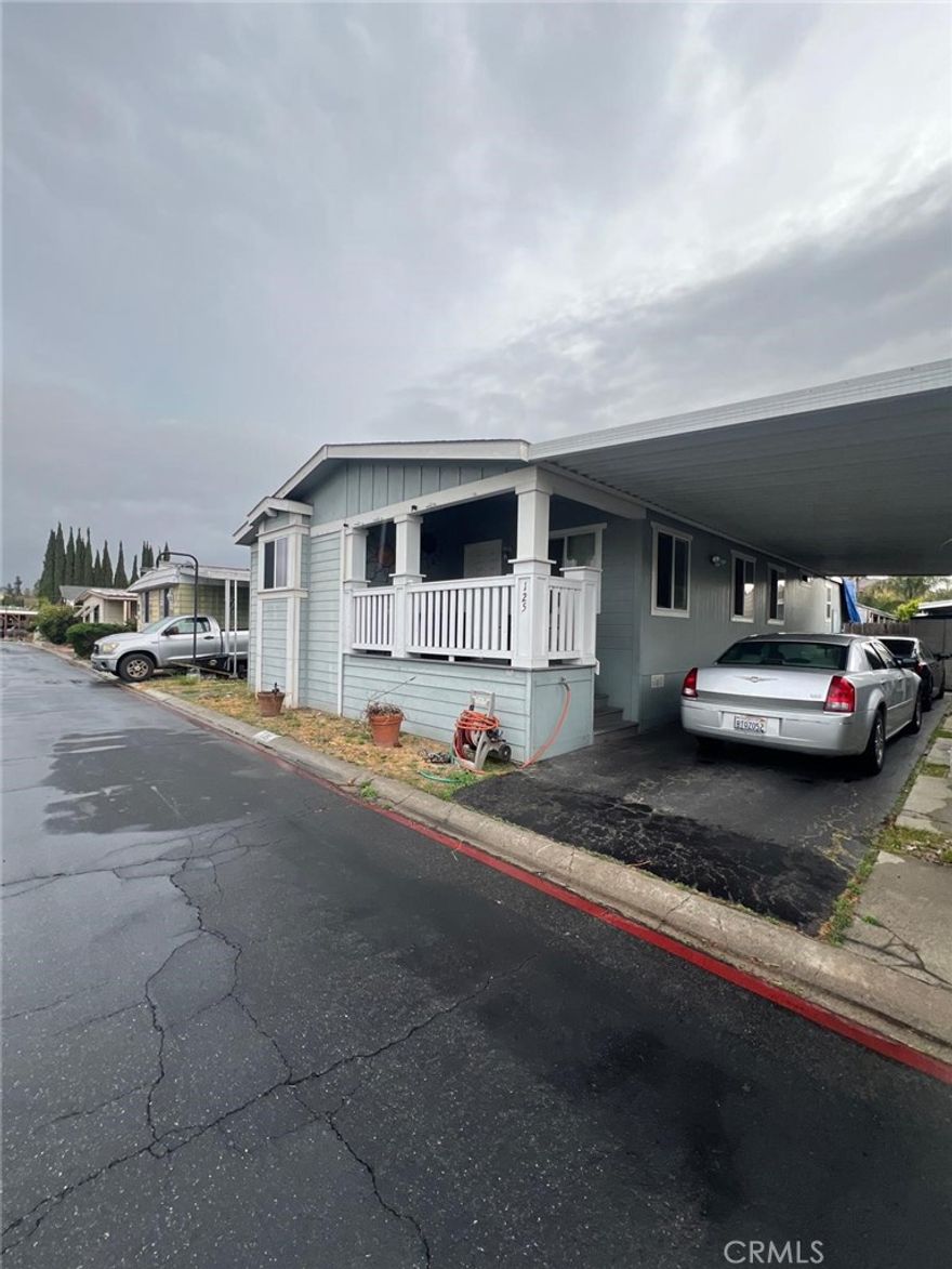 Amazing opportunity to own this mobile home located in Park Royale Mobile Home Park in Orange. This unique floor plan accommodates 3 Bedrooms / 2 Bathrooms in the main home plus a Den. All together, the home has approximately 1,534sqft of living space. The carport has space for up to four vehicles.  Located near major freeways (57, 5, 22), shopping, and entertainment. The Park Royale mobile home community also offers clubhouse, pool, spa, greenbelt, gym, and more.