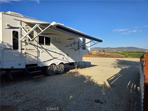 Photo of 39815 Jeremiah Road, Temecula, CA 92591 (MLS # SW26007762)