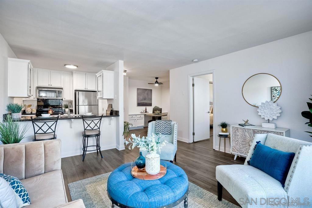 Open concept Living. This Rolando / College Area condo just a quick bike ride to SDSU. Well designed layout maximizes every inch of the space and dining area doubles as an office with a built in desk. Amenities include pool, spa, barbeque area and fitness center. Conveniently located near shops, restaurants and public transportation. Newer A/C unit. HOA includes water.