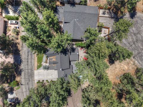 Photo of 457 Woodside Dr, Big Bear City, CA 92314 (MLS # SW25272508)