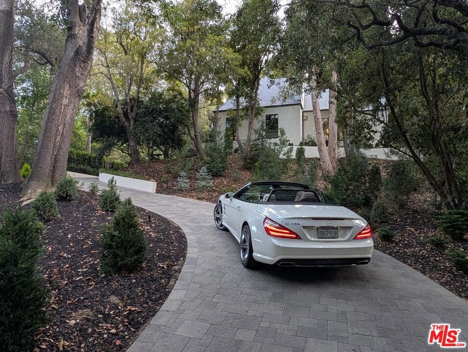 Photo of 943 Moraga Drive, Los Angeles, CA 90049 (MLS # 26857753)