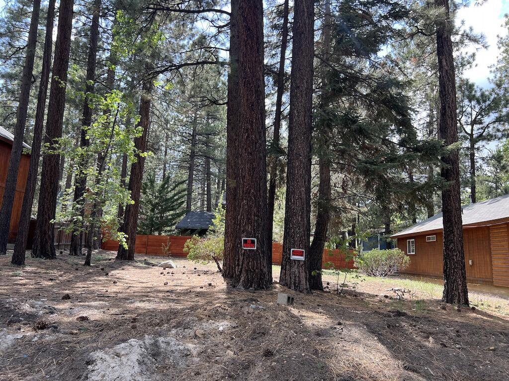 Opportunity knocks. Multi-family R3 Zoning on this desirable Summit Blvd lot. Public Utilities (water, sewer, natural gas) available at the street. One of the last vacant lots in this premium location. Just down the street from Snow Summit. Build your mountain home, duplex, or primary residence on this level well treed lot. Great for skiers, snowboarders, mountain bikers and investors.