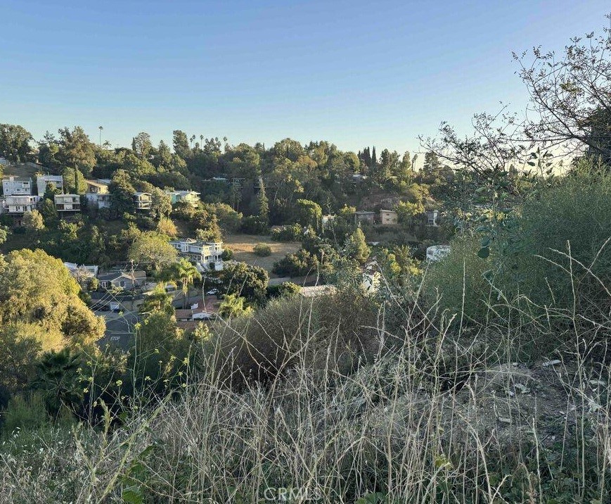 Lot on top of Elderbank Drive with 180-degree views to LA and Montecito Heights. This lot is nestled around the Arroyo Seco and minutes away from Downtown Los Angeles. Walking distance to Debs Park with hiking trails. Access to 110 freeway and all the restaurants in Highland Park in 5 min driving distance. Lots of new construction happening in this area. Reports available upon request that includes Survey, Geo's, etc. Lot is located before house address 3946 Elderbank Dr.