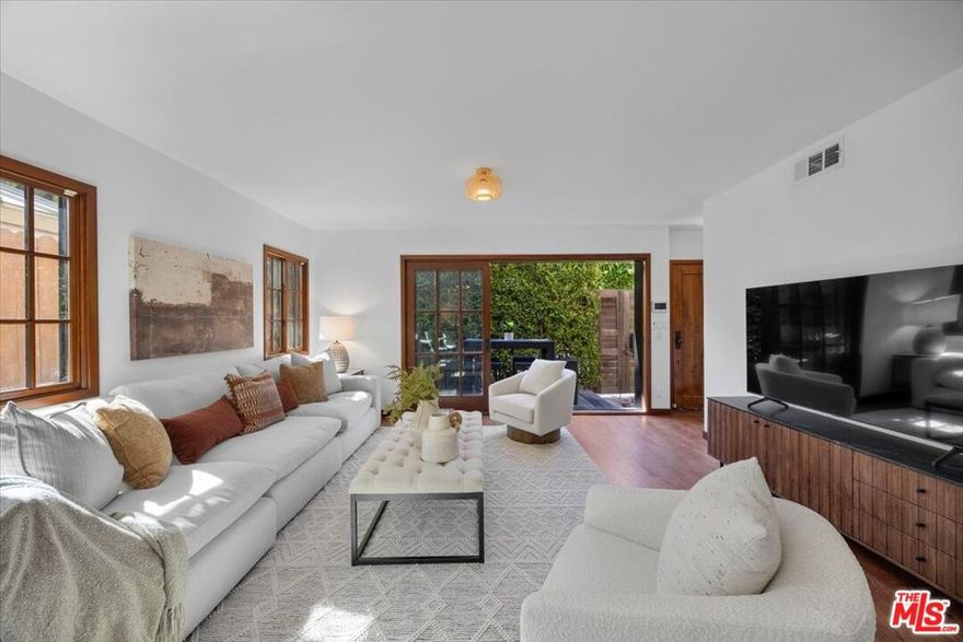 Experience the best of coastal luxury and Venice's creative spirit in this beautifully updated 4BD/3BA Mediterranean-style home. Offering approx. 2,200 sq ft on a 2,500+ sq ft lot, this residence is ideally located near the Venice Canals, Abbot Kinney, and the area's premier dining and boutiques. Enjoy a refreshed kitchen with porcelain tile countertops and farmhouse sink, an updated primary bath with terra cotta tiles, soaking tub, and custom shower. Fresh paint and newly rehoned floors enhance the bright, contemporary feel. Outdoors, new astroturf adds a pop of greenery alongside mature trees, a built-in grill, and an inviting fire pit - perfect for entertaining. The exterior was freshly painted this week (some photos may reflect prior color). Street parking alongside the property adds convenience. A true Venice charmer - ideal for a growing family or an investment property. Can't wait to show you this special home!