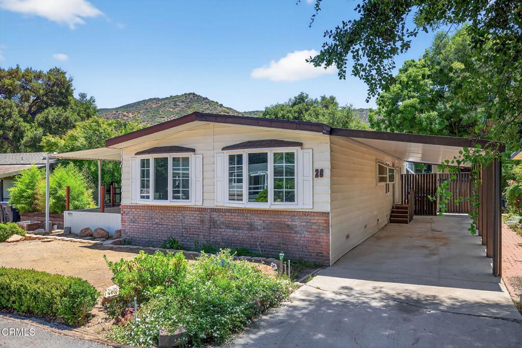 Your opportunity awaits! Nestled in the tree-lined streets of the gated Oak Forest Estates community, this spacious 2-bedroom 2-bathroom home is the perfect canvas for you to make your own. Surrounded by rolling hills, a peaceful creek and the shade of age-old Oaks, this property offers land ownership in congruence with nature. Community amenities, nearby hiking trails, proximity to shops, restaurants and Westlake Lake all make 26 Sherwood Drive the perfect opportunity to create your own getaway.