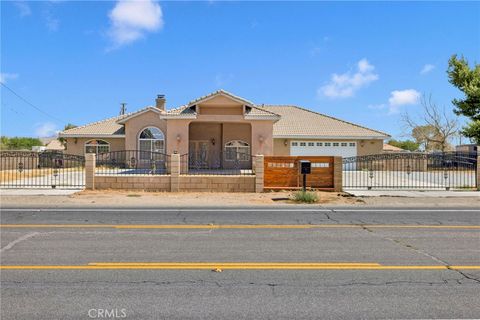 Photo of 13597 Kiowa Rd, Apple Valley, CA 92308 (MLS # HD26011440)