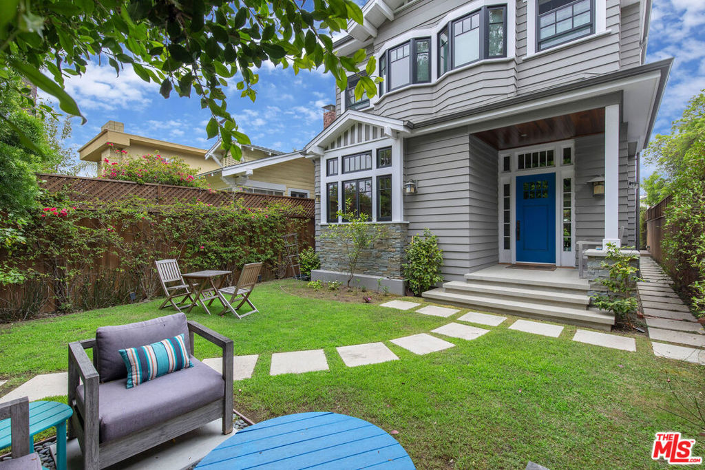 Start and end your days on the stunning rooftop deck of 106 Dudley, your front-row seat to sweeping ocean views, golden sunsets, and laid-back coastal living just one block from the beach. Built in 2018 and set on one of Venice's coveted walk streets, this contemporary Craftsman home is thoughtfully designed for the ultimate indoor/outdoor lifestyle. From the rooftop down to the private backyard, every space has been custom crafted with luxury finishes and effortless functionality. On the main level, the heart of the home is a gourmet chef's kitchen outfitted with high-end appliances, custom cabinetry, a walk-in pantry, and an expansive island perfect for hosting or daily life. The kitchen flows into the great room, which opens to the backyard through floor-to-ceiling doors that blur the line between inside and out. A dedicated dining area and a cozy den with stone fireplace add warmth and versatility. A smartly designed guest suite with a Murphy bed ideal as a home office completes the first floor. Upstairs, the spacious primary suite offers a serene retreat with a walk-in closet and spa-style bath featuring a deep soaking tub, walk-in shower, and dual vanities. Two additional bedroom search with walk-in closets share a beautifully appointed bathroom with double sinks. A central landing space makes the perfect home office, media lounge, or play area. The upstairs laundry room adds convenience right where you need it. However, it is the rooftop that truly sets this home apart--- and large deck offering the ideal backdrop for entertaining, relaxing, or simply grilling a homecooked meal in the ocean air enjoying a sunset over Venice Beach. Rounding out the property are gated front and rear outdoor spaces and a secure carport with parking for three cars. Just one block from the sand and moments to Abbot Kinney, Rose Avenue, Main Street, and one of the Westside's favorite farmers markets, 106 Dudley is a rare blend of luxury, location, and lifestyle.