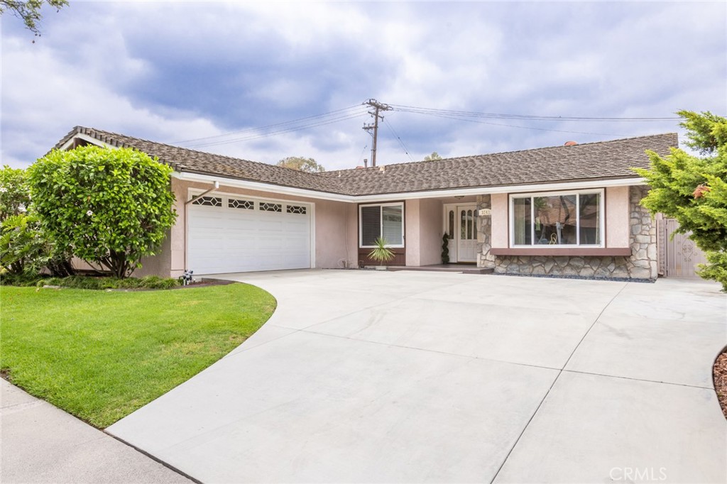 Spacious and full of character, this single-level 3-bedroom, 3-bathroom home sits in one of Fullerton’s most desired neighborhoods, that of Sunny Hills. Known for spacious lots, ranch-style homes, and true neighborhood charm with the highly desired Top-Rated schools! This beautiful home, boasting not 1 but 2 Primary bedroom suites, both with private garden access, perfect for mother-in-law or nanny quarters. Inside, you are welcomed by a family room with a flagstone trimmed fireplace and beautiful wood built-ins, opened to a spacious kitchen with its own eating area, separate from a formal dining room and living room with views of the garden, peaceful front and back yards, covered outdoor patios, perfect for indoor/outdoor living and entertaining. Your own private retreat, begin your day, soaking in nature with a warm cup of coffee, wind down and relax at the end of the day and the perfect gathering place for family and friends. Additional highlights include an indoor laundry/utility room, a 2-car attached garage with mid-century details, newer HVAC, water heater and dishwasher that is just a few months old, a generous backyard that offers mature landscaping and flat usable space where a former pool was professionally removed with permits. Perimeter block wall fencing and driveway have also been upgraded with permits. Don't miss this rare opportunity TO LIVE YOUR DREAM!