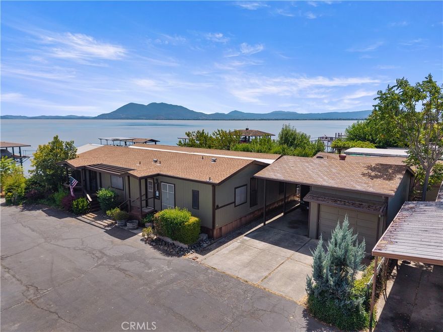 Invest in a Lifestyle, Not Just a Property!



Discover the endless possibilities of this unique lakefront property, perfect for bass fishermen, recreational rentals, or transforming back into a mobile home park. With its prime location and versatile design, this space is ideal for both leisure and enterprise.



The main home boasts 1,917 sq. ft. of comfortable living space, featuring three bedrooms and two bathrooms. Enjoy the spacious living area and kitchen, along with a generously sized master bedroom that includes an extra-large walk-in closet. Step out onto the front porch, just feet from the water, and soak in the breathtaking views.



Waterfront access is a highlight of this property, complete with a pier and a boat lift for all your aquatic adventures. The detached single-car garage offers approximately 400 sq. ft. of space, along with RV parking and a sewer hookup for convenience.



In addition to the main residence, this property includes four mobile homes and one rental space, providing a steady source of income year-round. The mobile homes vary in size: one is 840 sq. ft. with 2 bedrooms and 2 baths, $1010 in rent; another is 1,000 sq. ft. with 2 bedrooms and 2 baths,  $1,150 in rent a third is 1,152 sq. ft. with 3 bedrooms and 2 baths, rents for $1095; and the fourth is 720 sq. ft. Each unit features a paved driveway and a dedicated storage area. Rental space rents for $550 monthly. 



With 134 feet of waterfront and a well-maintained concrete seawall, you can rest assured that this property is both functional and protected—none of the units have ever flooded from the lake, per the seller. 



Seize this opportunity to invest in a property that combines leisure, income potential, and a beautiful location. Your dream lifestyle awaits!