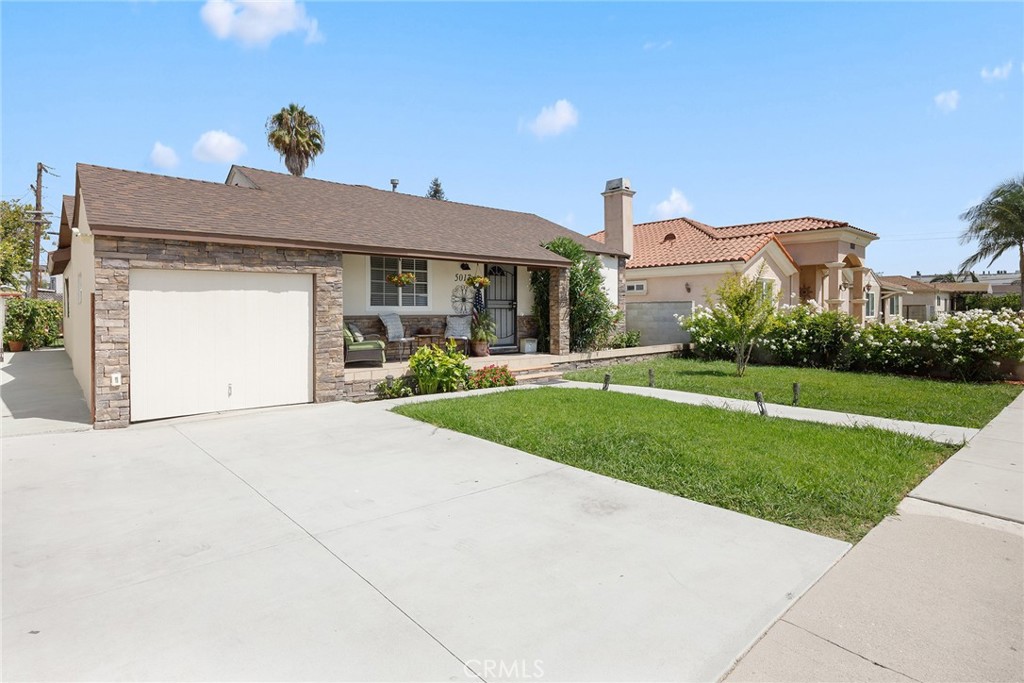 Buy a home with an ACTIVE INCOME STREAM. A portion of this home currently generates $4,500 in monthly income. Tremendous opportunity awaits with this spacious 5-bedroom, 3-bathroom, 1,931 sq. ft. home situated on a generous 7,032 sq. ft. lot in Hawthorne—just minutes from LAX, SoFi Stadium, and other major attractions.
This unique property is currently configured as two completely separate living quarters, offering incredible flexibility. The front section features 3 bedrooms, 2 bathrooms, a full kitchen, and a welcoming living room. The rear section provides 2 bedrooms, 1 bathroom, its own full kitchen, and a comfortable living area. A wall separates the two spaces, making it ideal for multi-generational living, rental income, or Airbnb opportunities. Owners can live in one section and rent the other, rent both sections, or even remove the dividing wall to restore it to a single, expansive residence. Though divided, the property is classified as a single-family residence—not a duplex.
The front exterior is beautifully landscaped, while the backyard offers an expansive yard complete with a playground, additional storage, and space to relax or entertain. The garage has been converted into an additional bedroom, with the garage door opening to reveal extra storage.
This meticulously maintained home boasts numerous upgrades and thoughtful features, including: Sprinkler systems in front and back, Newly replaced roof shingles, Fresh stucco with new plaster finish, New driveway, sidewalk, and entryway, Hallway addition to connect the converted garage, Two new dishwashers, Marmot countertop and backsplash, Fresh interior paint, Tankless water heater, Central A/C and heating for the front unit, plus central heating for the rear, Pantry addition in the back unit, Upgraded 200-amp electrical panel (solar ready), Updated bathroom sinks in the front unit, and New gates on both sides of the home.
Additional highlights include a vegetable garden and three fruit trees, adding charm and sustainability to this versatile property.
With its prime location, versatile layout, and extensive updates, this home presents endless opportunities for both homeowners and investors alike.