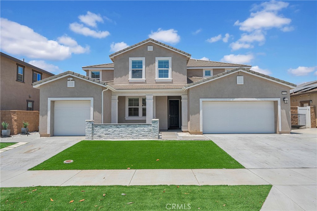 Newly built in 2022 with NO HOA, this stunning 6-bed, 5-bath home offers 4,121 sq ft of upgraded living space and Next Gen/ADU-style downstairs suite—perfect for multigenerational living, rental income, or guests. The downstairs unit includes 2 bedrooms, a private entrance, its own driveway and garage access, a kitchenette, living area, and separate laundry room. Upstairs features 5 bedrooms and 3 full bathrooms, including a spacious primary suite with mountain and city views and a junior suite with a private bath. A large upstairs loft offers flexibility as a gym, media room, or optional 7th bedroom. Additional highlights: two laundry rooms (upstairs and downstairs), open-concept kitchen, $80K in upgrades including modern flooring, extended concrete patio, and vinyl patio cover. Dual A/C systems. Prime location near Freeway 60, a golf course, and walking distance to a park with playground. A rare find combining space, privacy, and income potential under $1M.