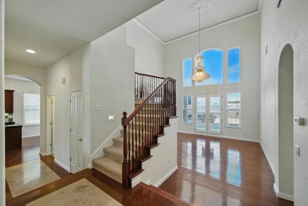 Tucked away in a peaceful culdesac in one of Elk Groves most sought-after neighborhoods, this stunning 5-bedroom, 3.5-bath home spans 2,724 sq ft of thoughtfully crafted space designed for modern multigenerational living. Located steps from Backer Park and in the heart of the top-rated Elk Grove Unified School District, this home offers unmatched functionality including a first-floor ADU-style suite, vaulted ceilings, and RV/boat parking in the extended driveway.