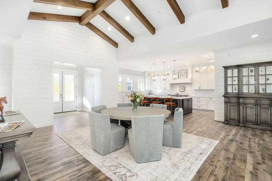 Completed in 2021, this custom-built property offers 5 bedrooms and 4.5 baths across two distinct wings: a luxurious primary suite and private guest quarters. The private guest wing is versatile, featuring a kitchenette and dedicated laundry, and can be locked off as an independent 4, 2, or 1-bedroom Casita--perfect for extended stays in beautiful Rancho Mirage. Built as a fully integrated smart home with meticulous attention to detail, the interior is defined by warmth.  Abundant windows flood the spaces with natural light, complementing the cozy feel of exposed dark beams and white wood paneling for a dramatic contrast. A chef's kitchen featuring oversized, high-end appliances and an extra large walk-in pantry is complemented by adjustable lighting modes for the perfect day or night mood. Seamlessly connecting indoor and outdoor living, the astounding 1,149 sq. ft. covered patio provides shade and space for grand entertaining. The spectacular 44-ft. LED-lit pool is the centerpiece, flanked by dual lounge areas, an outdoor BBQ and bar, a large fire pit, a bocce ball court, and sweeping south-facing mountain views. No expense was spared in the design, architecture, craftsmanship, and upgrades of this estate. It is perfectly situated in the Coachella Valley's most prestigious town, between El Paseo and Palm Springs.
