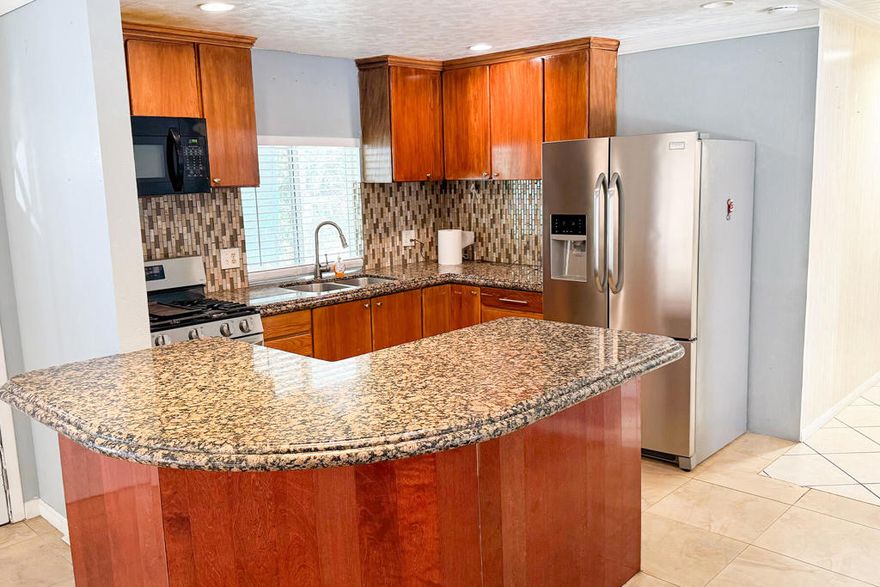 Welcome to this beautiful 2-bedroom, 2 bathroom home offering comfort, style, and convenience. Enjoy a modern open-concept layout with a spacious kitchen featuring a breakfast counter-perfect for casual dining or entertaining . Nestled in a desirable community, residents enjoy access to a sparkling pool, relaxing spa, and a stylish clubhouse. Best of all, you're just minutes from the world renowned El Paseo shopping district, know for upscale boutiques, fine dining, and vibrant culture. A perfect blend of luxury and life style awaits  Space Rent Covers the land lease!