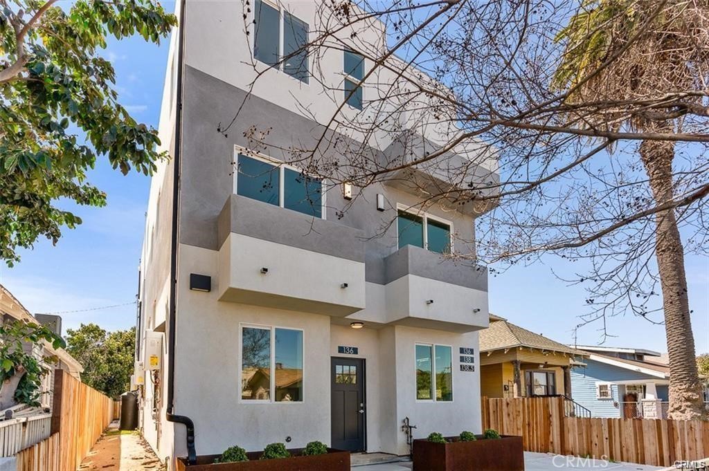 Welcome to 136 W. 48th St, New Construction Triplex (townhome style units). The triplex consists of (3) 3-Bedroom / 3-Bathroom units. Unit 136 is 1406sf, Unit 138 is 1466sf and unit 138 1/2 is 1285sf. There is a master ensuite unit with walk-in closet, freestanding tubs and balcony in each unit. 6 of the 9 Bedrooms have their own balcony. Views of Downtown in the front unit. The property has (1) two-car side by side garage (rented by one of the tenants) and two single parking spaces located in the rear of the property. Each unit includes separate entrances, high efficient tankless water heaters, dual pane vinyl windows, quartz countertops, wood shaker cabinets, waterproof laminate flooring throughout, Berber carpet on the stairs, mirrored closet doors, frameless shower doors, Mitsubishi multizone mini-split celling mounted AC/Heat units throughout (individually controlled per room) and rooftop solar for each unit. The property has artificial lawn to minimize maintenance and water usage. This is new construction, no rent control! Each unit is newly rented. This is a stabilized asset. Agents bring your Buyers/Investors