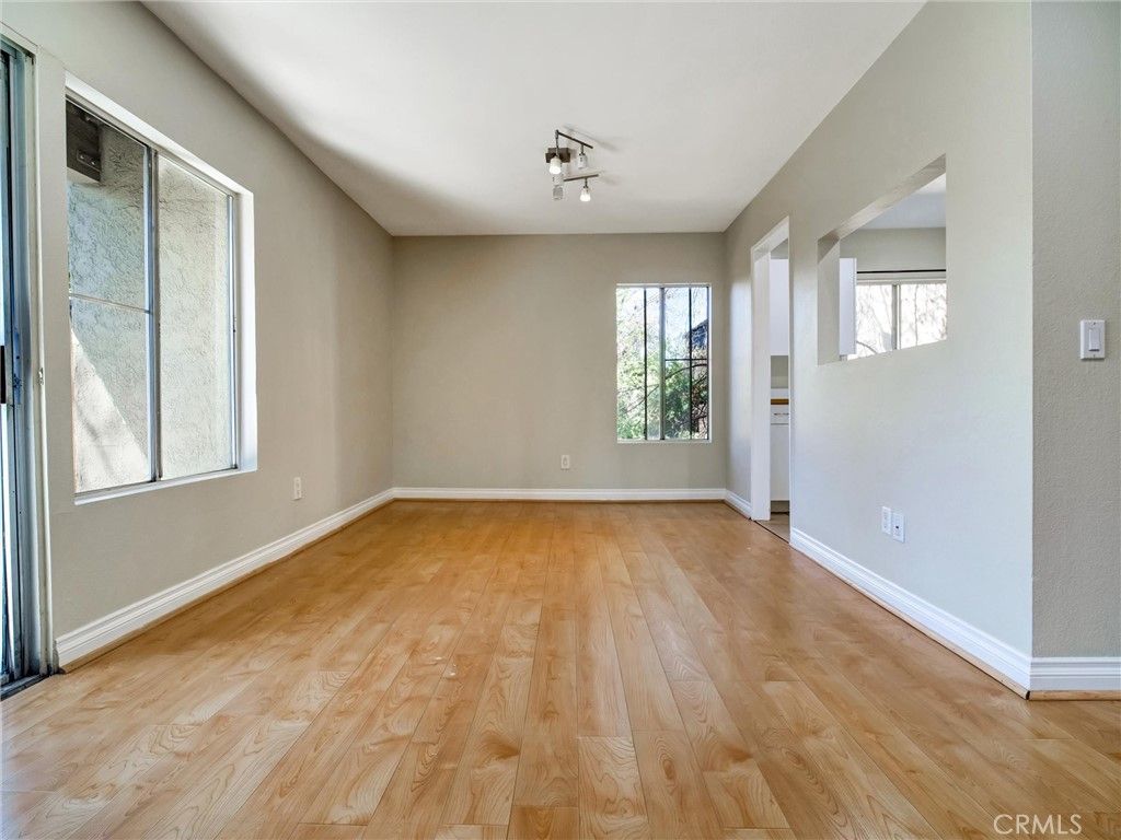 Photo of 18350 Hatteras #123, Tarzana, CA 91356 (MLS # SR26069936)