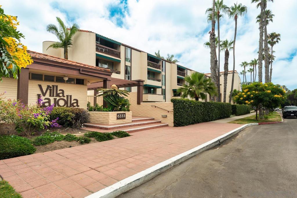 Welcome to your coastal retreat in the heart of La Jolla! This top-floor unit offers serene west facing overlooking the community's lush pool courtyard with peak ocean views. Light-filled and airy, the home features an ideal layout with a peaceful ambiance just moments from Windansea Beach, local cafes, and boutiques. Enjoy the tranquility of top-floor living with no neighbors above and easy access to all that La Jolla has to offer. Close to La Jolla schools and only 3 blocks to WindanSea beach!