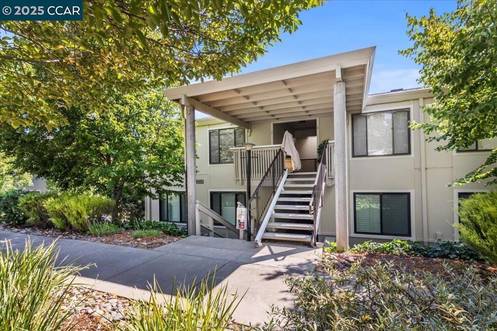 Light, bright and airy this fully expanded and enclosed Sequoia wrap is ready to move into and enjoy all the amenities that Rossmoor has to offer.Sweeping hill views from the living area with walls of windows that fully wrap around to bring in tons of natural light. Spacious open floor plan with ample space for living and entertaining.Shows modern with smooth ceilings and fresh paint. New carpet in the bedrooms. Updated kitchen with stone counters, neutral cabinets and flooring.Fully updated bathroom with modern vanity and double wide shower. Large storage closet with shelves in the bath for linens. Full size washer dryer in the Wrap. Extra closet with mirrored sliders for additional storage.Rare to find a wrap that flows so seamlessly, tons of possibilities for a home office, artist studio or additional bedroom. Rossmoor is an active 55 plus community in a natural peaceful setting. Surrounded by nature and hiking trails, minutes to downtown Walnut Creek, shops, restaurants, Bart. Golf, tennis, pickle ball, state of the art fitness center, ping pong, bocce, lapidary, ceramic studio, wood shop, theater, and clubs for every type of interest.Come see this beautiful Unit in an amazing setting!