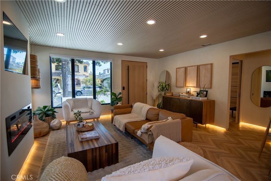 What if a home could actually turn back time?



Step into 285 Ravenna Ave and feel an instant refresh — a home so thoughtfully reimagined, it might just make you feel a year younger. Skip the chaos of construction and the endless decision fatigue of a remodel. This is your chance to move into a true turnkey masterpiece — and reclaim a full year of your life.



Every inch of this home has been recreated to deliver sophisticated design, intelligent flow, and uncompromising quality — now more than 600 square feet larger than the original footprint. With over $500,000 in documented renovations, the craftsmanship speaks for itself.



From microcement finishes and hand-applied limewash walls/ceilings to the herringbone flooring, every detail tells a story of artistry and modern luxury.  Did I mention the illuminated shadow boxes-you just won't find this again.



Schedule your private tour and experience firsthand what Coastal Living truly feels like — right here in Naples, Long Beach.



The Home:



A rare single-level retreat offering flexible living — 3 bedrooms plus an optional 4th — surrounded by 7' walled garden and warm, modern design. The primary suite is a serene sanctuary with a spa-inspired bath and the second of three fireplaces, creating an atmosphere of calm and understated elegance.

A versatile multipurpose garage extends your living space, perfect for a guest suite, private office, gym, or den — a thoughtful touch that adapts effortlessly to your lifestyle.



The Location:



Ideally situated moments from the beach, scenic canals, and the boutiques and restaurants of 2nd Street, this home captures the essence of Southern California coastal living — casual yet sophisticated, vibrant yet serene.



With every detail meticulously curated and no expense spared, 285 Ravenna stands among the most distinguished homes in Long Beach — a true statement of style, function, and timeless design.