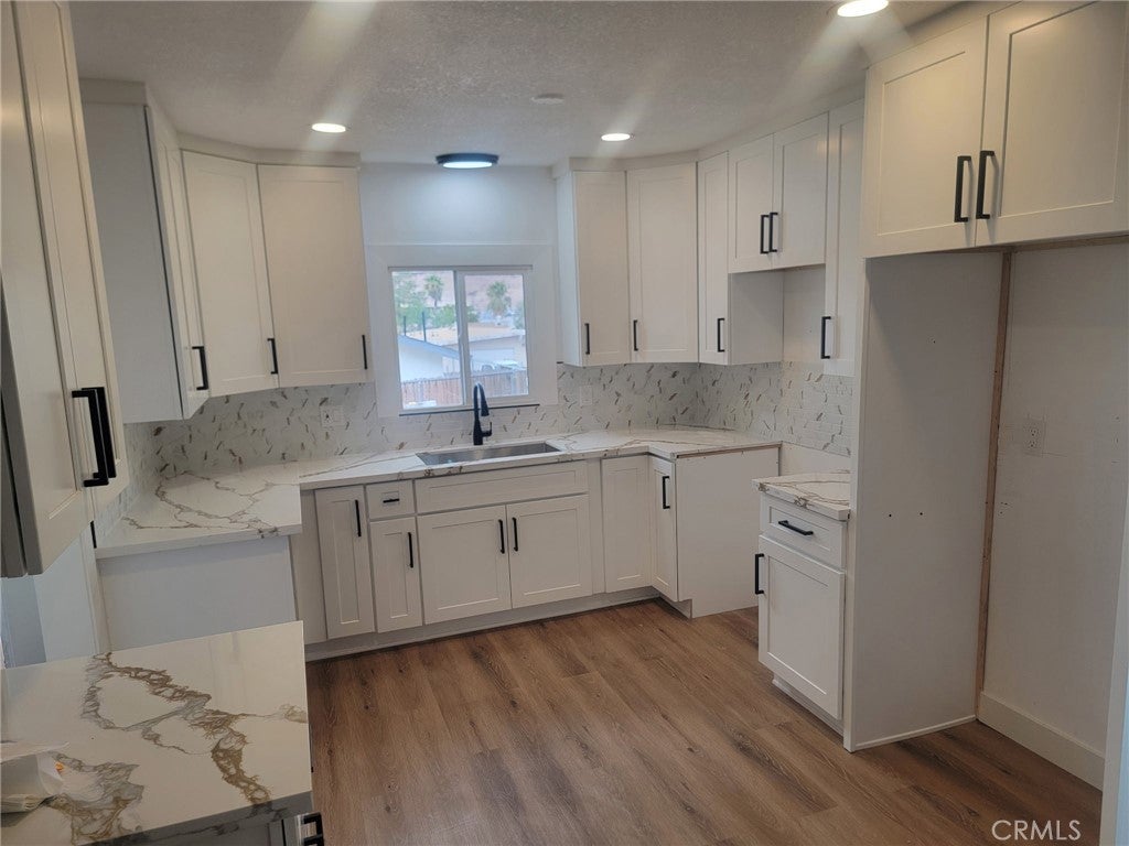 Photo of 651 W Buena Vista ST, Barstow, CA 92311 (MLS # IV26228905)