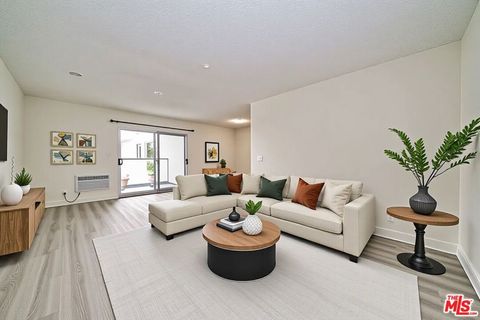 Photo of 425 S Willaman Drive #306, Los Angeles, CA 90048 (MLS # 26644785)