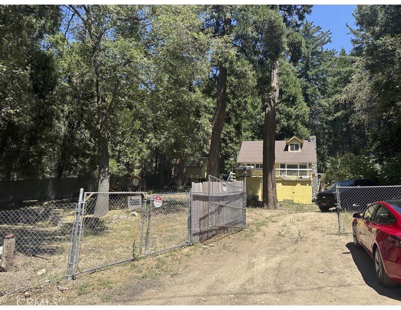Bring your Vision and Discover The Potential of this Fixer-Upper Mountain Home, Located on a HUGE 17,830 Sq.Ft. Lot Near Lake Gregory. This 2 Bedroom, 1 Bathroom, 876 Sq.Ft. Home Offers Privacy and Plenty of Parking! There is a Workshop/Basement, A Seperate Shed At The Top Left Side of the Property, Fencing, Beautiful Shading Trees, The List Goes On! Whether You Are An Investor, Contractor, or Homeowner Ready To Renovate, This Home Offers an Opportuniy to Create Your Dream Retreat With Loads Of Potential!