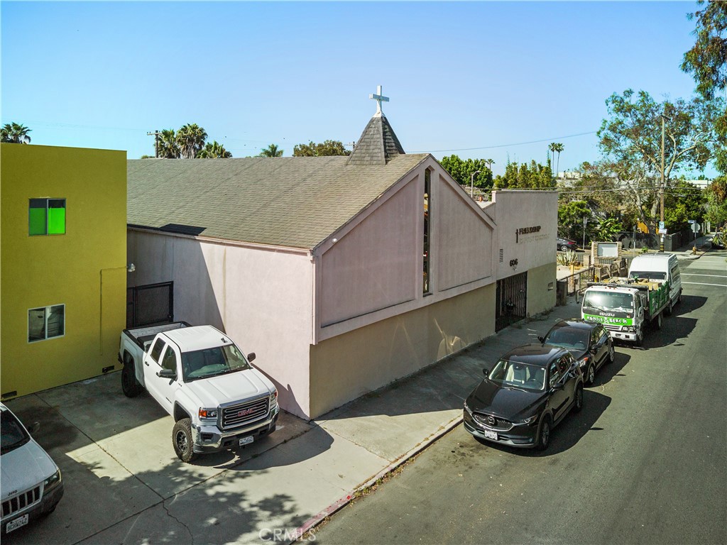 Exceptional Venice Development Opportunity – 602–606 Broadway Street
Fathom Realty is proud to present a rare and exciting opportunity to acquire two contiguous parcels in the vibrant creative corridor of Venice Beach. Located at 602–606 Broadway Street, this offering includes a charming wood-frame church building and an adjacent parking lot, spanning a combined 13,747 square feet of flat, utility-connected land.
The existing 4,550-square-foot structure, originally built in 1927, offers vintage character and potential for adaptive reuse. Rear alley access adds functional value and flexibility for future development. Zoned LARD 1.5, the property supports a variety of dynamic options—ranging from boutique housing and small-lot subdivisions to imaginative mixed-use or adaptive reuse projects.
Set in the heart of Venice, this location is just blocks from the iconic Abbot Kinney Boulevard—home to world-renowned cafés, designer boutiques, acclaimed restaurants, and an eclectic mix of community events. The beach and boardwalk are only a 4-minute bike ride away, offering the quintessential Southern California lifestyle at your doorstep.
This is an exceptional opportunity for developers, visionaries, or community-focused investors seeking to shape a new chapter in one of Los Angeles’ most iconic neighborhoods.
For inquiries or representation, please contact us directly. Buyer to perform all due diligence.