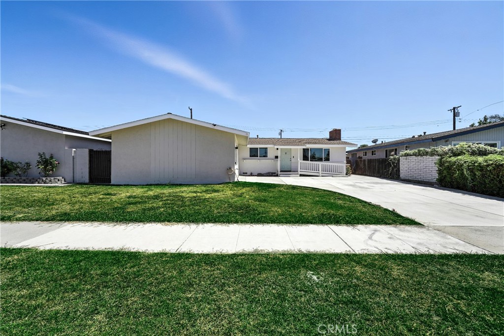 Beautifully Remodeled Home in the Charming City of Orange!
This stunning home features 3 bedrooms plus a spacious bonus room currently being used as a 4th bedroom, complete with a walk-in closet and a retreat/office area. The open floor plan boasts fresh interior paint, recessed lighting, new flooring, and double-pane windows. Both bathrooms have been tastefully remodeled, and the kitchen is a showstopper with new stainless steel appliances, quartz countertops, stylish backsplash, and brand-new cabinetry. The modern fireplace in the living room creates a cozy ambiance for relaxing evenings. The backyard is perfect for entertaining, featuring a good-sized yard and a covered patio. Additional upgrades include a two-car garage with new drywall, laundry hookups, and a brand-new driveway. Conveniently located near El Camino Real Park, Sycamore Elementary, Portola Middle School, Angel Stadium, local hospitals, Old Towne Orange, and more! A must-see!