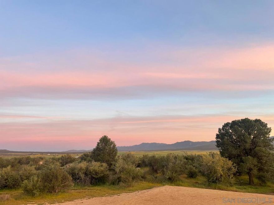 Panoramic Views and Prime Location in Anza Valley! Enjoy sweeping mountain and valley views from this beautiful 4.6-acre parcel just minutes from town and within walking distance to Highway 371. A newly drilled well produces an impressive 20+ gallons per minute, and power is available at the property line. Natural rock outcroppings, seasonal wildflowers and solar lights add charm to this impressive property! A Sea Train storage container is on property for storage and utility. Experience four true seasons and endless possibilities—multiple building sites for your custom home, agricultural use, or hobby farming. A stunning setting with exceptional infrastructure and potential!