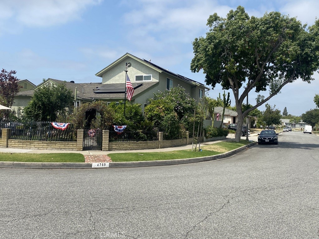 If you are looking for an extra large family home or home to have nanny or in-laws live with you and at a really good price, This is it!!!!...How often does a home come on the market with over 2500sq.ft. and Yes, 5 bedrooms and 4 bathrooms...There is a large master upstairs with sitting area and bathroom and another large bedroom downstairs with a private bathroom....Plus, you get a Beautiful remodeled kitchen with built-ins, large farm style sink, granite counters and a 3 person breakfast bar+paid off solar panels for electric with back up battery, 3 upgraded electrical panels, both double paned windows and outside painted in 2024, roof approx. 16 yrs. old and when seller bought the home it was stated that copper plumbing had been put in. Water heater is only 7 yrs. old, expensive roll up commercial garage door + entrance to house from garage, sprinklers front and back, roof approx. 16 yrs old, CA & FAH....Corner lot on a fairly private street...Please look past all of seller's stuff, they have help & movers coming to put them in storage while they sell the home.