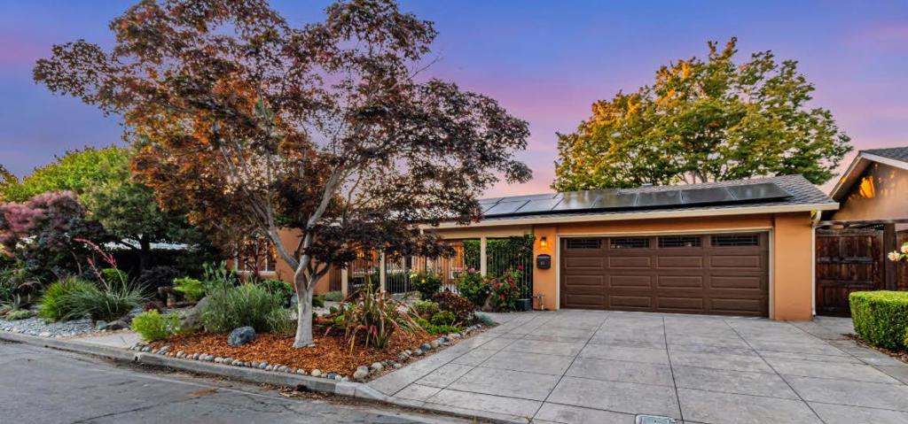 Beautiful single level home perfectly located on a quiet cul de sac with a large courtyard that welcomes you home while filling the home with light. 3/4 inch Brazilian Cherry hardwood floors throughout along with LED lighting and fresh paint. The owned solar system was installed in 2022 and cuts the cost of keeping cool with the central A/C. The kitchen was remodeled with stainless appliances, two ovens, granite counters and 5 burner gas range. The living room has vaulted ceilings, a cozy gas fireplace and is filled with natural light. The family room is right off the kitchen and flows into the backyard with a huge custom redwood pergola. There is a beautiful 234sf. sunroom in the back of the house for additional all weather enjoyment as well as access to the hot tub. The large primary suite has two closets, two sinks and connects to the sunroom. The junior suite is a perfect space for guests or family. There is fresh paint, new recessed LED lighting and a beautiful Teakwood breakfast bar in the kitchen. Spacious garage has epoxied floors and extra storage. It is in the perfect location close to the Pruneyard, Downtown Campbell, schools and easy access to freeways.