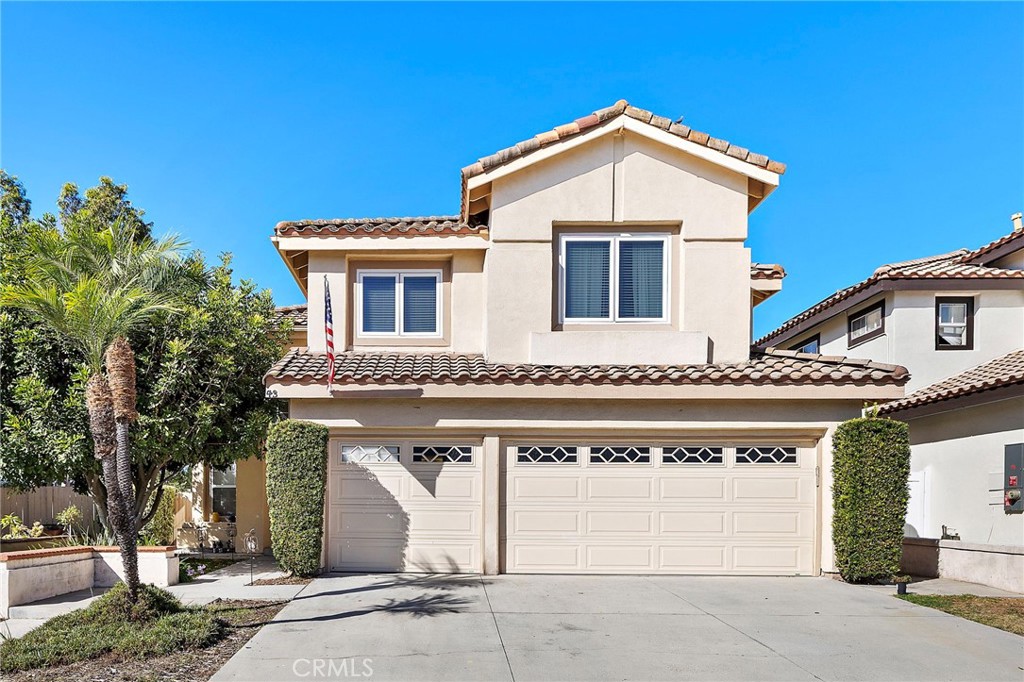 This beautiful 4-bedroom home sits on one of the largest lots in the community, offering both generous living space and scenic views.
Inside, you’ll find soaring ceilings, formal living and dining rooms, and an open floor plan designed for comfort and entertaining. The kitchen is equipped with stone countertops, double oven, dishwasher, and ample cabinetry, flowing seamlessly into the cozy family room with fireplace. All bedrooms are located upstairs, including a spacious primary suite.
The private backyard is an outdoor retreat, featuring a covered patio, built-in BBQ island, tranquil water fountain, and secure fencing — perfect for relaxation and entertaining. Additional highlights include a 3-car garage (one bay converted to storage), central A/C, forced heating, laminate and carpet flooring, and an individual laundry room.
Enjoy resort-style amenities with access to the RSM Beach Club, 4 pools, tennis, baseball and basketball courts, biking trails, and parks. Conveniently located near hospitals, toll roads, freeways, shopping, and schools, and just a 9-minute drive to Santa Margarita High School.