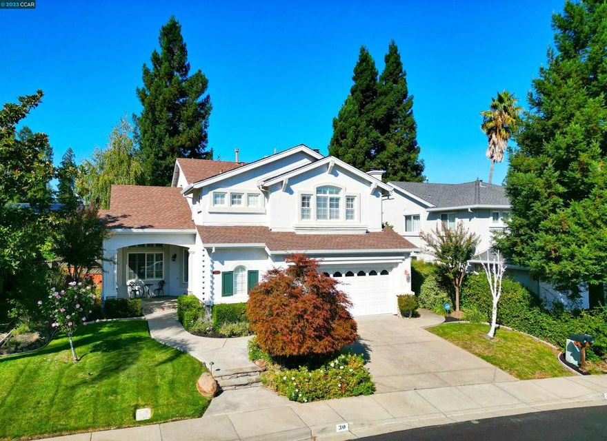 Located in the highly desirable Greystone Ranch community, this home is both timeless and modern. Step onto the large inviting stone porch, perfect for enjoying your morning coffee. As you enter the home, you will be greeted by the high ceilings and bright, open floor plan that allows for an abundance of natural light Newly updated laminate flooring on the main level and planation shutters throughout the home add a touch of modern elegance. The kitchen has been beautifully updated with quartz countertops and features a spacious walk-in pantry, providing ample storage. The family room is centered around the cozy brick fireplace, perfect for quiet evenings at home. The primary suite offers a tranquil space with en-suite bath complete with soaking up and separate shower. The garage offers lots of built-in storage. The backyard has been meticulously landscaped with beautiful trees and plants. The spacious deck provides an ideal spot for outdoor dining and entertaining. The terraced planters create the perfect space to plant your favorite flowers or vegetables, all while enjoying the sunshine. Close to top-rated schools, parks, trails, shopping and dining at The Lot City Center, and freeway access. With its modern upgrades and thoughtful design, you’ll want to call this place home!