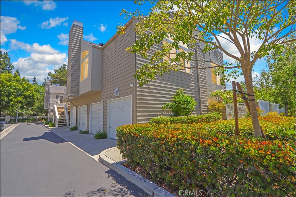 Stunning two-bedroom, two-bath home in the highly desirable Glenwood Village community of Aliso Viejo. This bright and open floor plan offers a convenient main-level primary suite with a walk-in closet, along with a second bedroom and full bath upstairs for added privacy. The upgraded kitchen features granite countertops, travertine backsplash, newer cabinetry, and all essential appliances including a refrigerator, stove, washer and dryer. The spacious living room boasts vaulted ceilings, a cozy fireplace, and direct access to a private balcony with peaceful, tree-lined views. Additional highlights include plantation shutters, crown molding, updated bathrooms, in-unit laundry, a one-car garage, and central A/C. As a resident of Glenwood Village, you’ll enjoy access to resort-style amenities including a sparkling pool, spa, fitness center, tennis courts, and beautifully maintained grounds. Located just steps from Pinewood Park and minutes from shopping, dining, hiking trails, and top-rated Capistrano Unified schools!