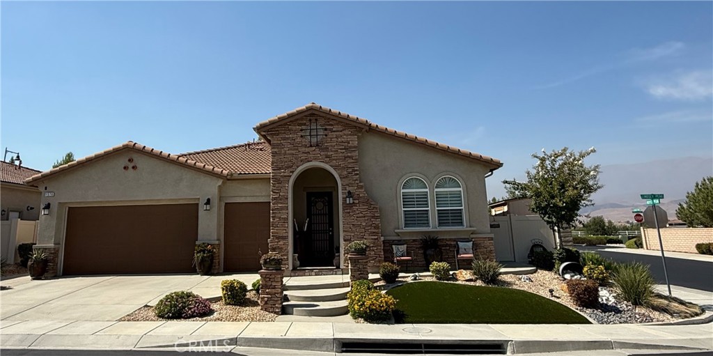Welcome to one of the Four Seasons 55+ gated community’s premier residences – the exceptional Rosette model! Nestled in a serene cul-de-sac, this 2,700 sq. ft. single-story stunner offers exceptional curb appeal with stamped concrete, leaf-lined landscaping, decorative rock pathways, and a beautiful wrought iron entry gate.
Step inside to a versatile office/den, elegant formal dining room, and a chef’s kitchen featuring rich cherry oak cabinetry, an oversized quartz island, custom tile backsplash, premium range hood, and upgraded lighting. The open-concept living area is adorned with beautiful custom fit shutters, upgraded ceiling fans, and flows seamlessly to the outdoor living space.
The luxurious primary suite includes patio access, an expansive bath, and a walk-in shower & closet. The generous guest suite offers its own private bath for visiting family or friends. Wood and tile flooring run throughout, complemented by a large laundry room with sink and cabinetry, plus a 2-car garage Plus a Golf Car Garage with EV charging for both Tesla and non-Tesla vehicles.
Step outside to your private resort-style backyard with a covered patio, built-in BBQ, and your very own golf putting green. Low-maintenance landscaping, artificial turf, and multiple seating areas create the perfect setting for entertaining or relaxing year-round.
Four Seasons residents enjoy unmatched amenities: three clubhouses, three pools (two indoor, one outdoor), spa, bistro, movie theater, fitness centers, salon, library, tennis, pickleball, shuffleboard, horseshoes, dog park, and over six miles of scenic nature trails. Located just 30 miles from Palm Springs, with shopping, dining, Cabazon Outlets, casinos, and top medical facilities nearby.
This move-in-ready home offers luxury, comfort, and community; select furnishings may be available. Don’t miss the chance to make it yours!