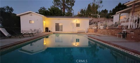 Photo of 4910 Brewster Dr #2, Tarzana, CA 91356 (MLS # SR26119150)