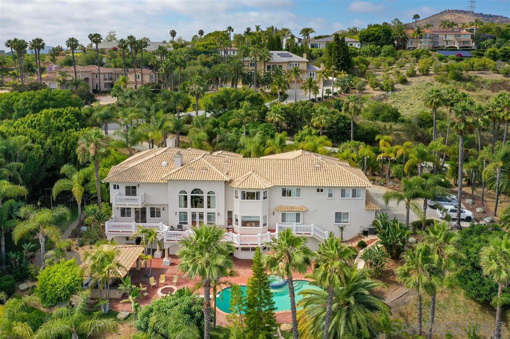 European Estate located on 2.03 acres in the gated Enclave of The Summit. Features two dedicated offices, a dedicated media room, gym, family room, guest and recreation spaces. Seven generous bedroom suites provide privacy and relaxation.Recently remodled kitchen and guest casita, feautring wood floors.The outdoors has an abundance of amenities including a tennis court with lights, a volleyball court, an exotic pool and spa and a covered palapa with barbeque and wet bar, all surrounded by a lush lawn. Roger Rowe Schools
