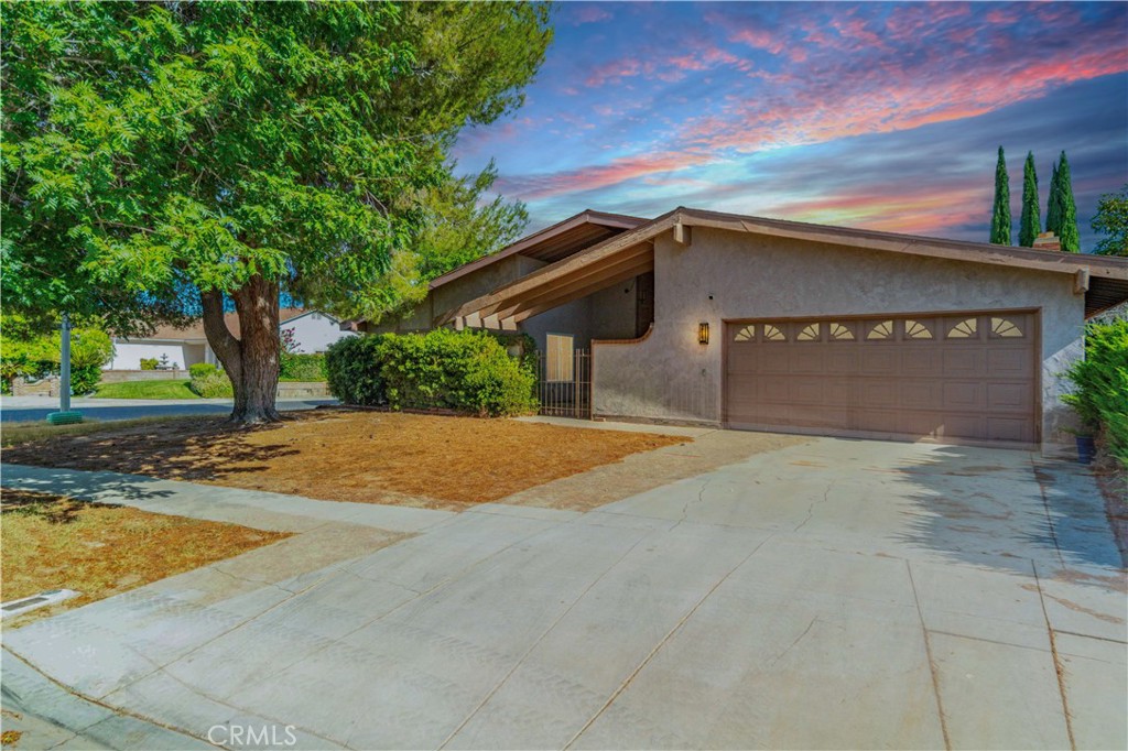 West Lancaster 4 Bed, 2 Bath, 2,099sqft Opportunity! Located in a picturesque cul de sac and close to shopping, dining, schools and entertainment, this home offers the opportunity to make it your dream home. With a great floorplan, soaring ceilings and 2,000 square feet of living space, the possibilities are endless. When you enter the home you enter into a huge step down living room with beamed ceilings, great light, impressive fireplace and smooth open concept transition to the formal dining room. From here, you move to the second spacious living area with a fireplace and connection to the kitchen. Here is where your creativity can go wild with visions of updates and use of the incredible floor plan. On the opposite side of the home, the living quarters are comprised of 3 good sized bedrooms that share the first of 2 bathrooms and the large primary suite, complete with a walk-in closet and its own bathroom. Now the pièce de résistance, the jewel of the home…the MASSIVE enclosed patio/sunroom with a wall of windows and 2 story ceiling. This space is incredible and it is accessible from just about everywhere in the home. With a slider leading to the back living room, a slider from the primary suite, double doors from the kitchen and a window from the kitchen with a ledge that creates a fantastic passthrough for all of your summer BBQ bashes, large holiday gatherings and more! Without a doubt this home has great potential for investors looking for their next project or the ambitious home buyer that wants a project with great bones, awesome floor plan and exciting possibilities, to create their forever home.