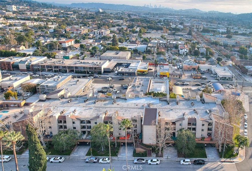 Discover comfortable living in the heart of Glendale with this updated 2-bedroom, 2-bath corner unit. Thoughtfully renovated, it features new hardwood flooring, fresh interior paint, quartz countertops, central air and heat, and a welcoming living room with a fireplace. The private balcony offers relaxing mountain views, and the in-unit laundry area adds everyday convenience. The primary bedroom includes a walk-in closet, and the unit comes with two gated subterranean parking spaces with storage. The well-kept complex offers elevator access and desirable amenities including a pool, spa, tennis court, and BBQ area. Located near a variety of shopping, dining, entertainment, local services, and transportation options at The Americana at Brand and Glendale Galleria, this property offers an appealing lifestyle and comfortable surroundings.