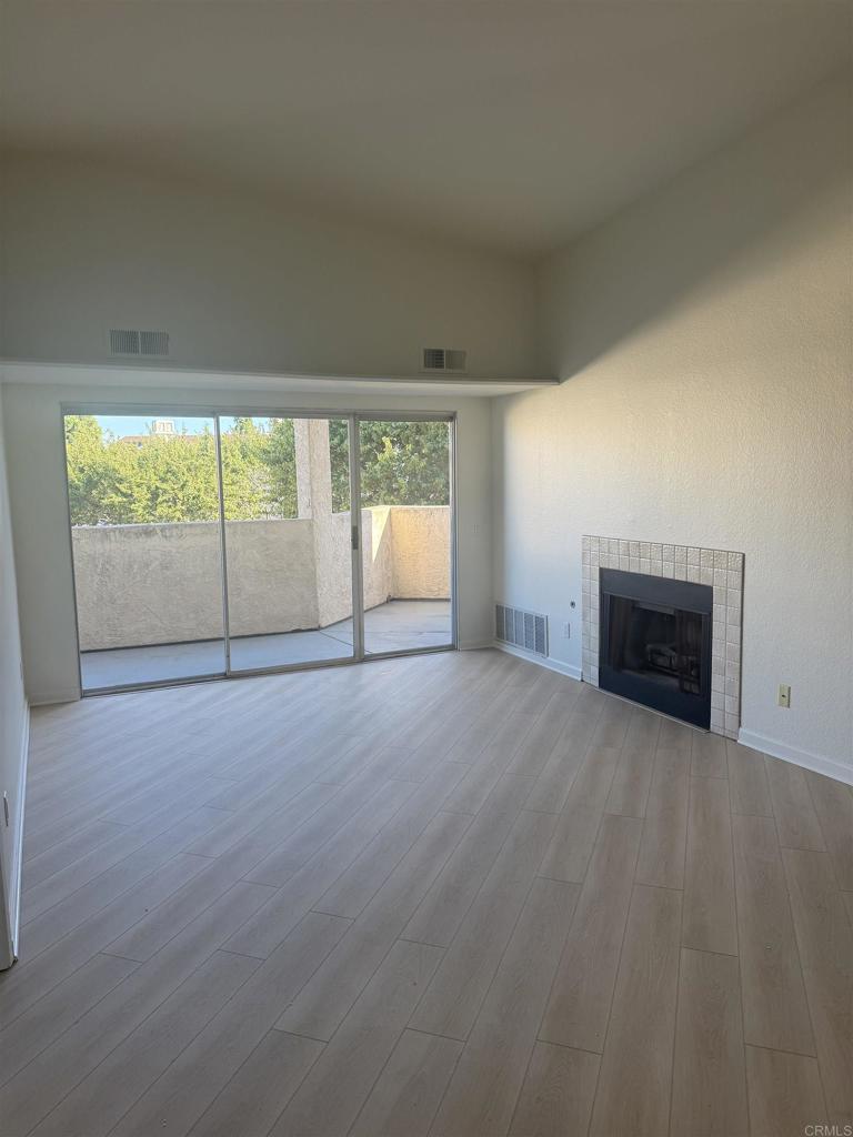 Spacious TOP FLOOR 2-bedroom, 2-bath condo available in the desirable City Scene community of Mission Valley. This unfurnished upper-level unit offers an open floor plan with abundant natural light, and a private balcony with access from all rooms. The living area features a fireplace and flows seamlessly into the dining space and kitchen, which includes appliances and ample storage. The primary suite offers dual closets and an ensuite bath. A second full bedroom and bath provide an ideal setup for roommates, guests, or a home office. Additional features include in-unit washer/dryer, central A/C, and a two car tandem garage. Community amenities include a pool, spa, fitness center, and well-maintained landscaped grounds. Prime Mission Valley location just minutes from Fashion Valley, USD, Mission Bay, Downtown, and major freeways. Available now. No furniture included.